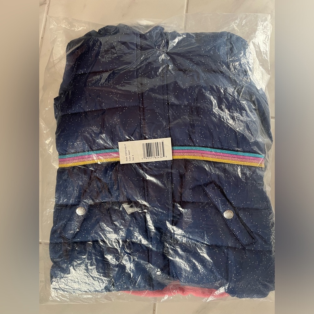 Carter’s Kids sparkly navy Puffer Jacket. Never been opened.
